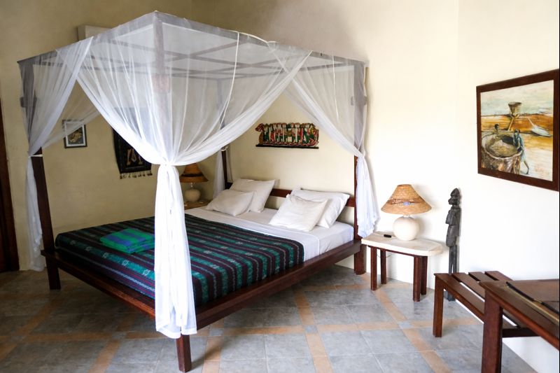 Poolside Bungalows with ceiling fan in Hotel Uyah Amed Bali